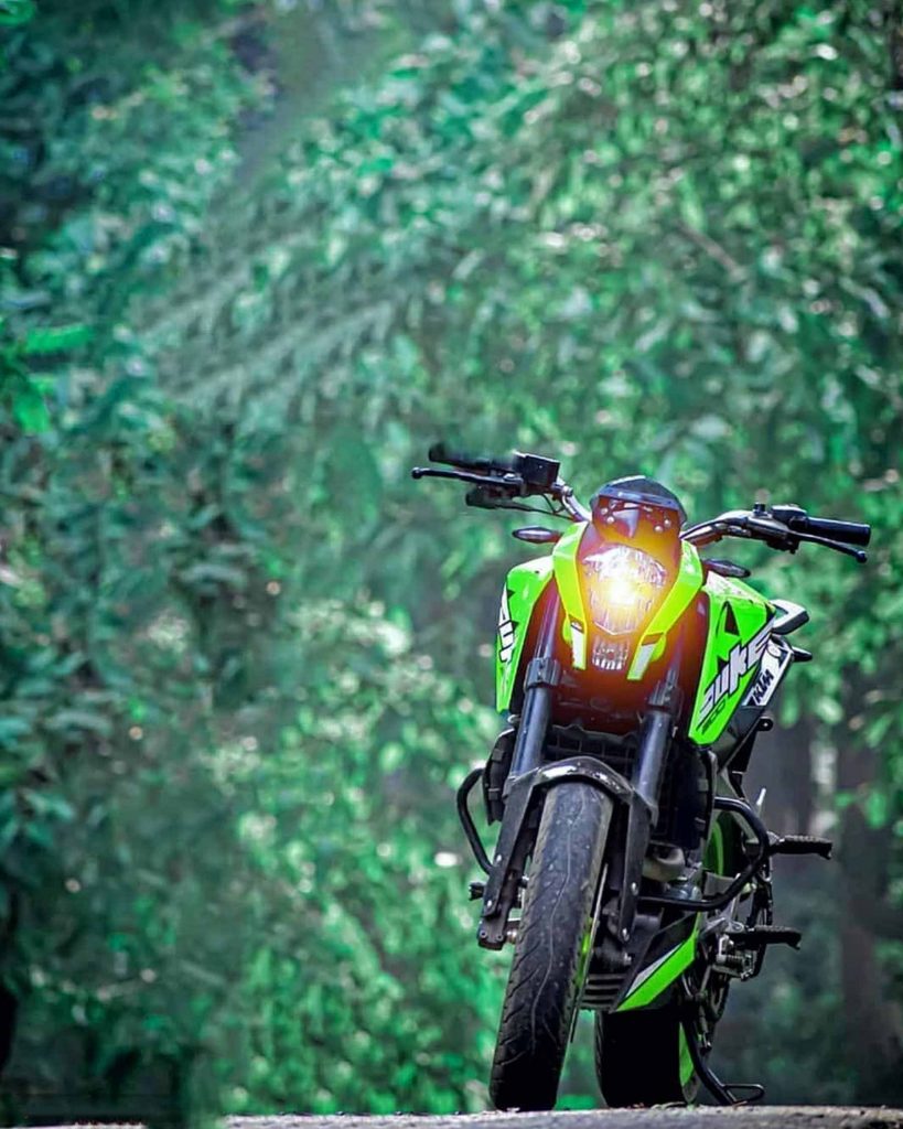 Duke Bike Green Color CB Background  Free Stock Image