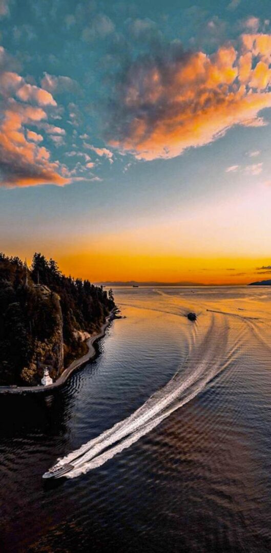 Moving Boat in Ocean iPhone Wallpaper Full HD